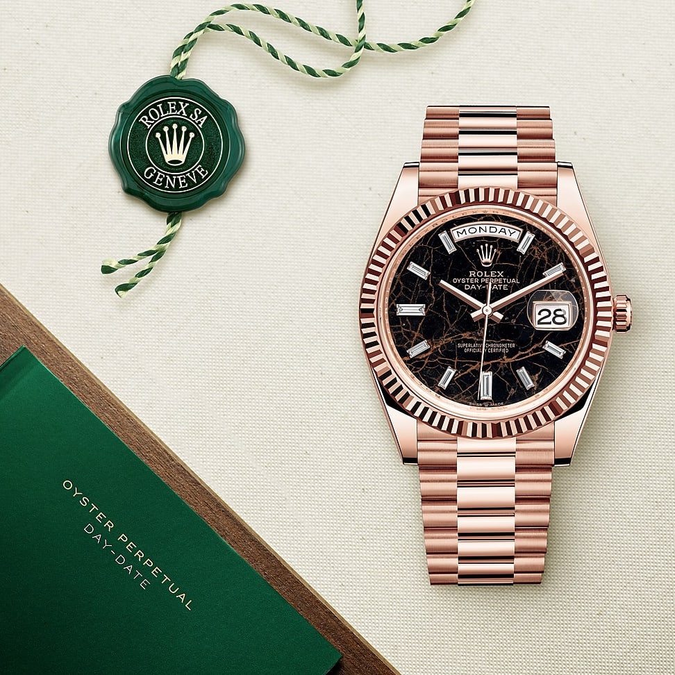 Rolex Day Date 40 Rose Gold Fluted Eisenkiesel Baguette