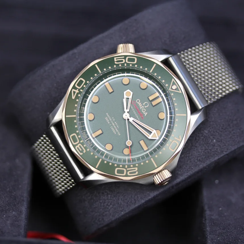 2025 Omega Seamaster Diver 300M Master Co-Axial 42 Titanium / Bronze Gold / Green / Bracelet 210.90.42.20.10.001