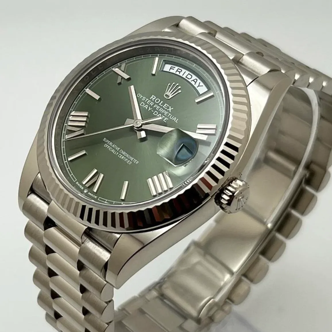 Rolex Day-Date 40 White Gold / Fluted / Olive-Green / Roman 228239-0033 Listing Image 2
