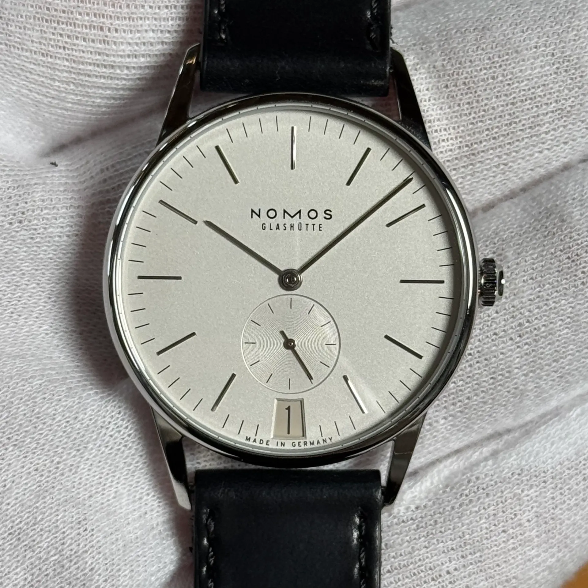 Auction: 2016 Nomos Glashütte Orion 38 Date White Open Case Back