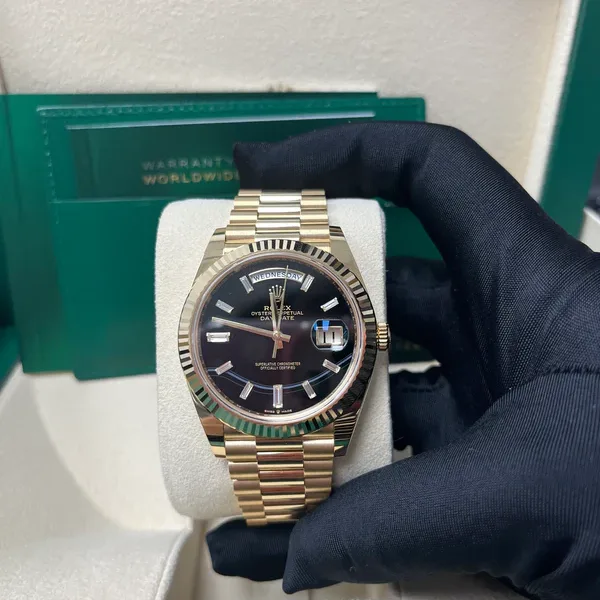 Rolex Day-Date 40 Yellow Gold / Fluted / Black / Baguette Diamond-Set 228238-0004 Listing Image 1