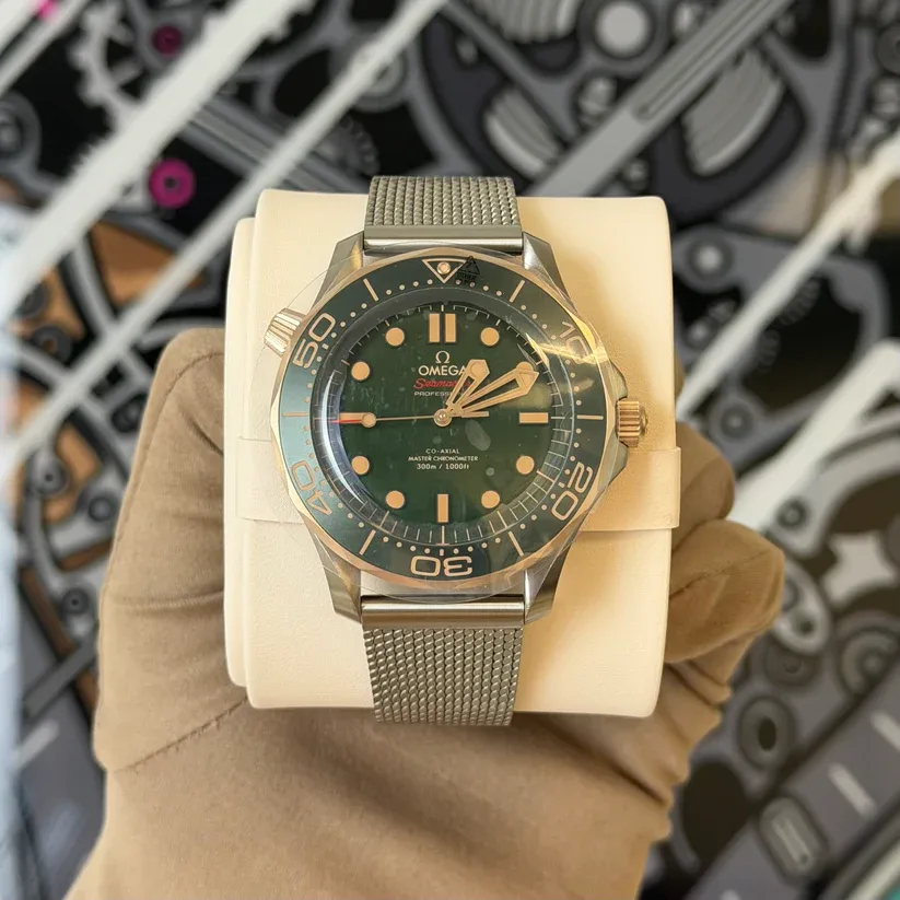 2025 Omega Seamaster Diver 300M Master Co-Axial 42 Titanium / Bronze Gold / Green / Bracelet 210.90.42.20.10.001