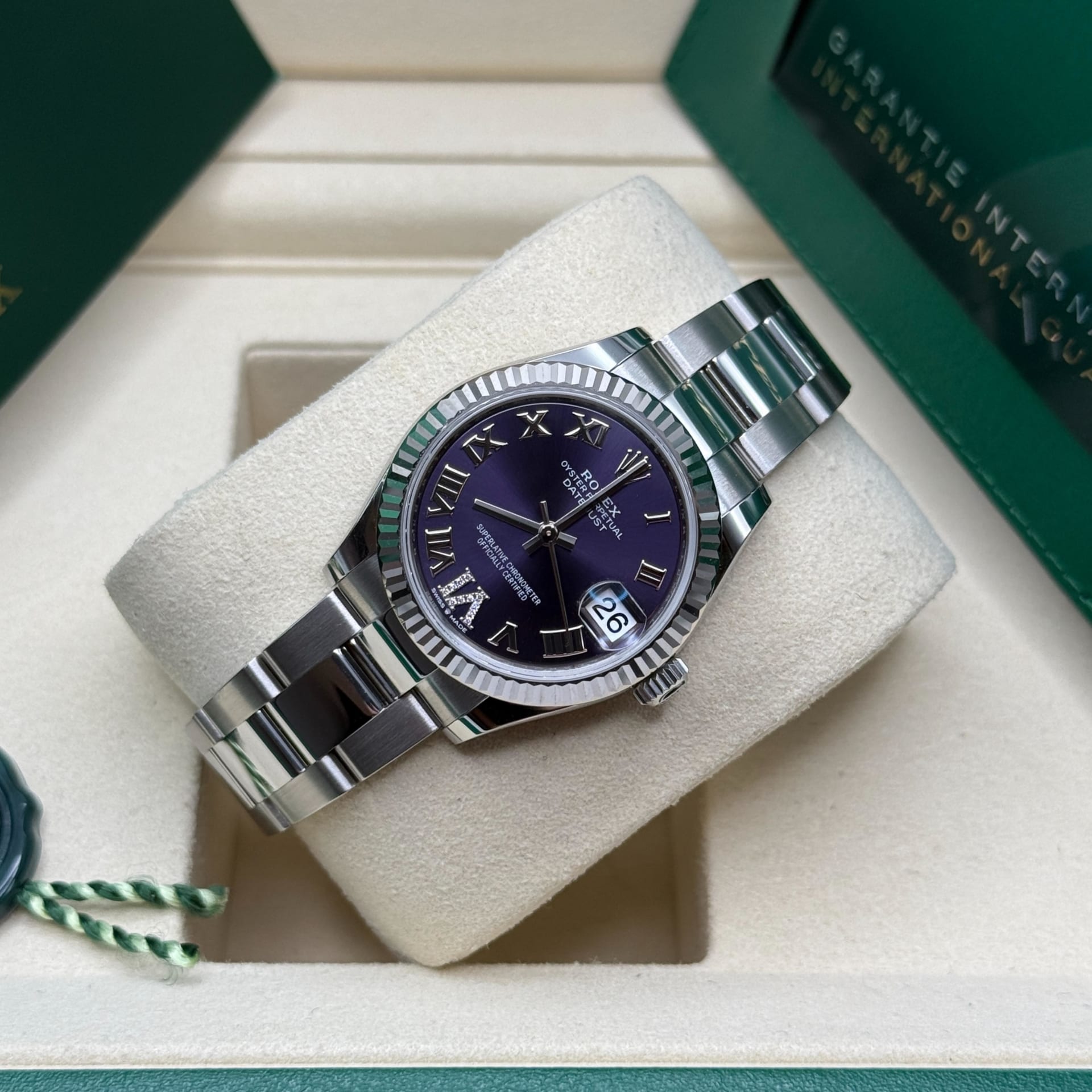 Rolex Datejust 31 Fluted / Aubergine / Diamond-Set Roman / Oyster