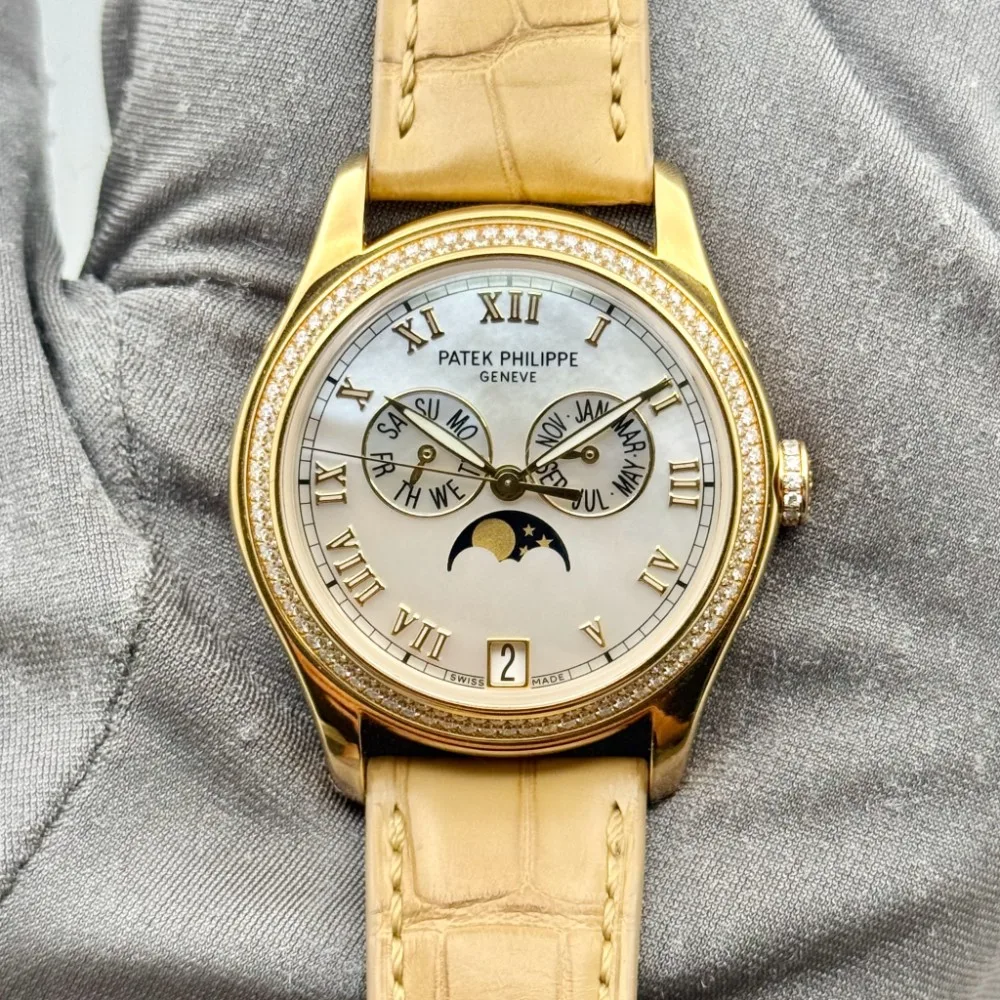 2015 Patek Philippe Ladies Annual Calendar Yellow Gold / Diamond-Set / MOP / Roman 4936J-001