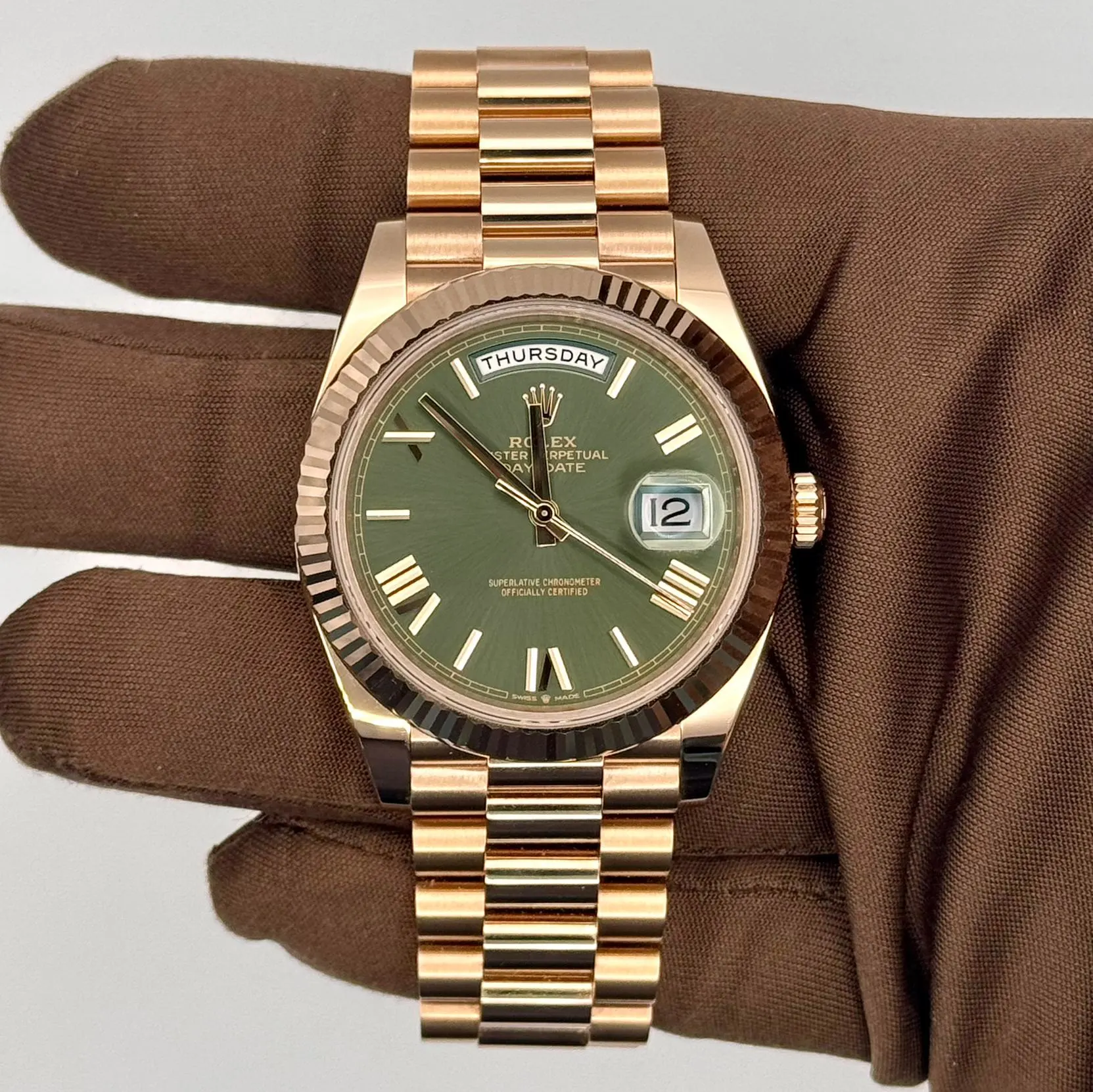 2023 Rolex Day-Date 40 Rose Gold / Fluted / Olive-Green / Roman / President 228235-0025 Listing Image 1
